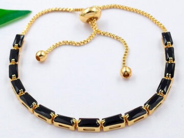 Pulsera dorada ajustable c/pedrería negra
