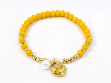 Pulsera elástica cristales amarillos dije corazón dorado