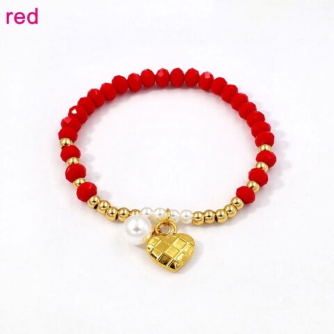 Pulsera elástica cristales rojos dije corazón dorado