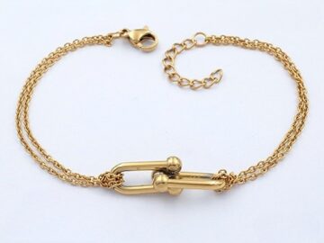 Pulsera dorada dijes T.Ffany