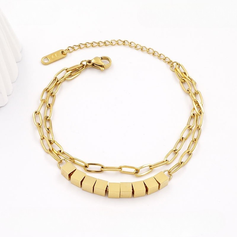 Pulsera dorada doble cadena cuentas cuadradas