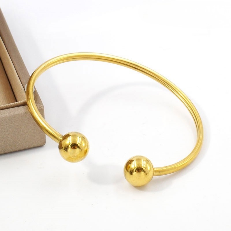 Brazalete dorado 6cm bolitas