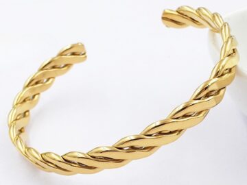 Pulsera dorada abierta diseño trenzado