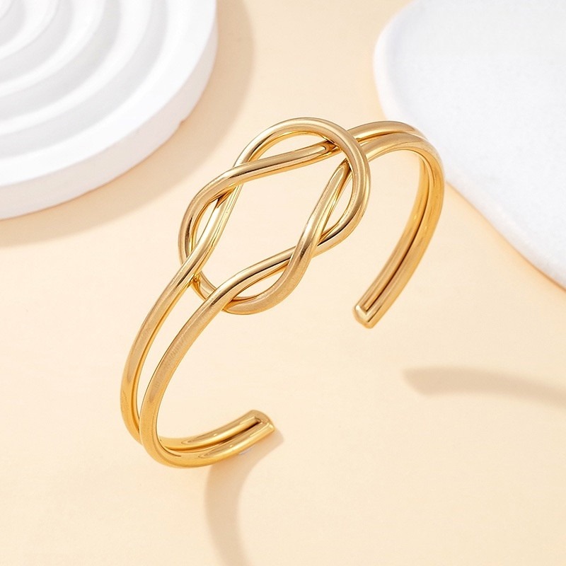 Brazalete dorado 6.3cm diseño al frente