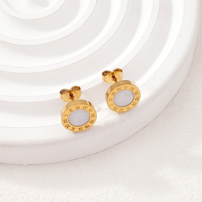 Aretes dorados 1cm. nácar blanco