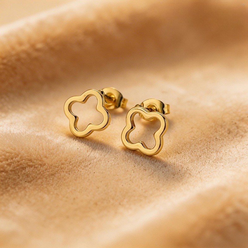 Aretes dorados silueta LV