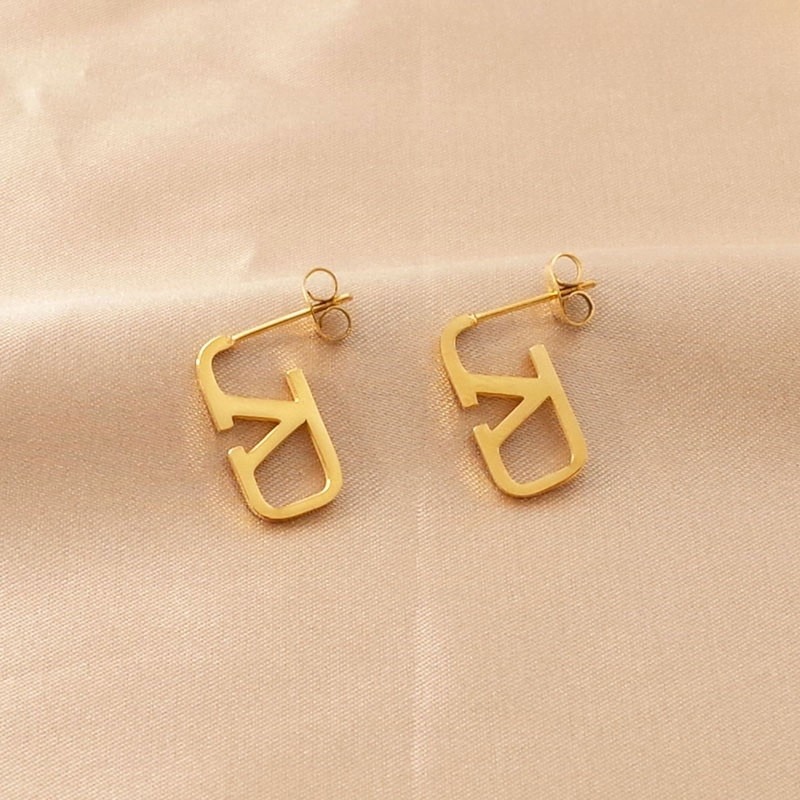Aretes dorados diseño VaLenTino"