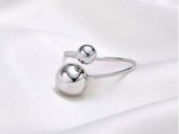 Anillo plateado 2 bolitas al frente