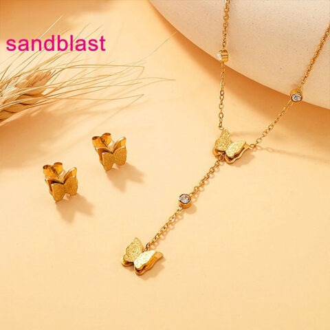 Set dorado Collar y aretes maripositas