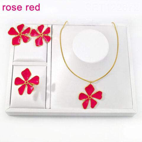Set dorado flor grande color fucsia
