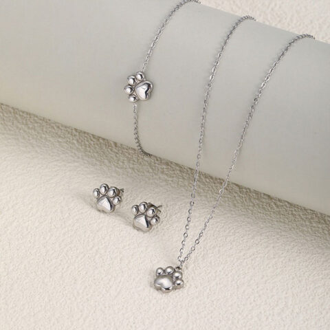 Set plateado Collar, pulsera y aretitos huellita