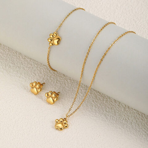 Set dorado Collar, pulsera y aretitos huellita
