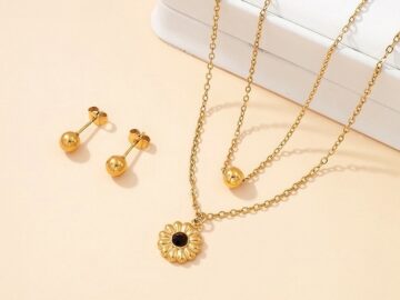Set dorado collar doble dije flor
