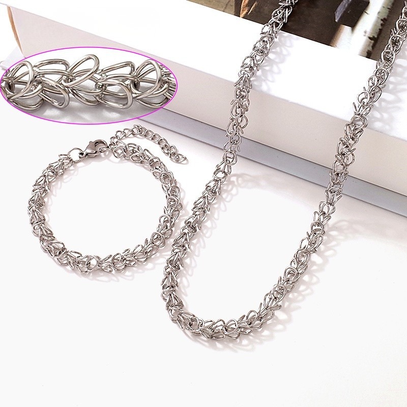 Set plateado collar y pulsera eslabón nido
