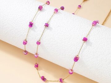 Set dorado piedras fucsia
