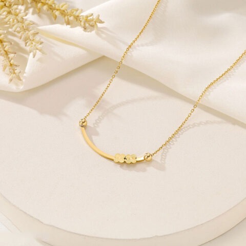 Collar dorado plaquita con alhambras
